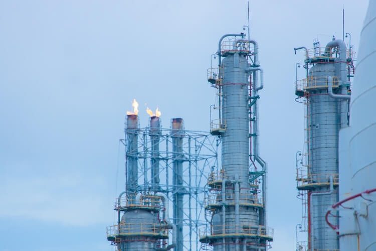 Methane Gas Fire High Flare Stack Flaring Tower Platform in Refinery Petroleum Plant or Flame Burn On Offshore Oil Extraction Process.