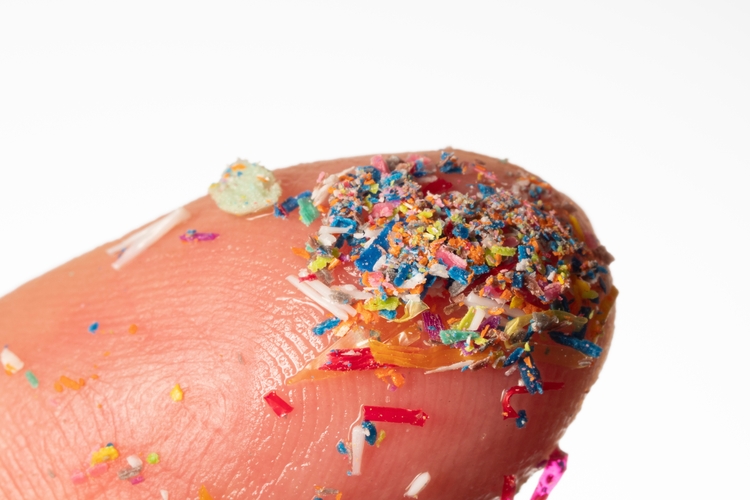 Microplastics on finger