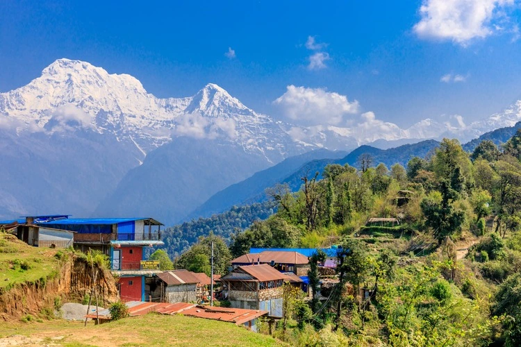 Annapurna South, Mardi Himal and Machapuchare mountain summits snow peaks in Himalayas range, Nepal.