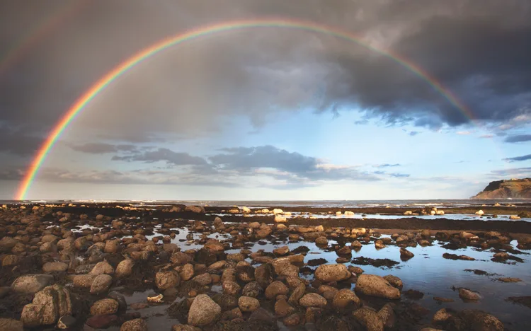 A rainbow arching over Robin Hood's Bay