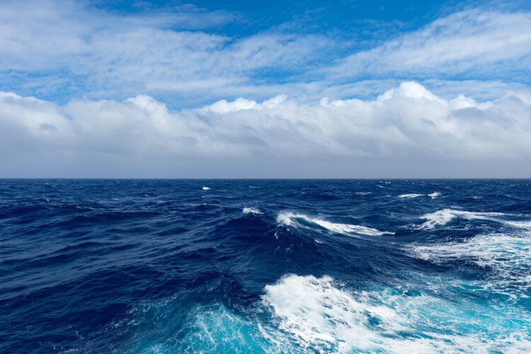 View of waves and clouds of Pacific Ocean