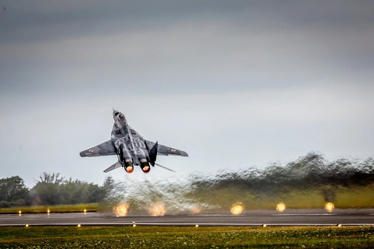 A Polish Air Force Mig-29 Fulcrum fighter taking off on full afterburners, RAF Fairford, Swindon, Gloucestershire, UK