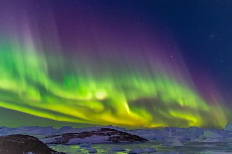 The polar aurora over the Larsemann Hills, Prydz Bay, Antarctica