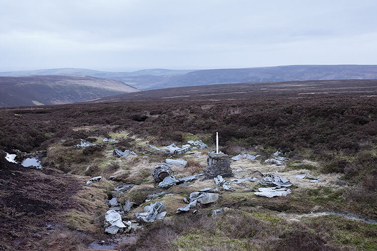 Sykes Moor. A memorial placed in 1991 marks the site where Pilot Officer Stanley Robinson and Acting Pilot Officer Jack Thomas lost their lives in January 1939 during a local flying exercise. The wreckage was discovered by a member of a local walking club two weeks