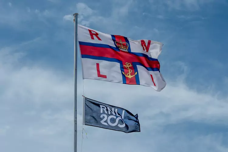 RNLI flags blowing in the wind