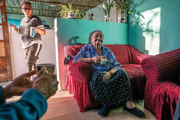 ‘Aunty’ Anna Salomo, 84, whose family has been harvesting rooibos for generations, drinks a cup of rooibos tea
