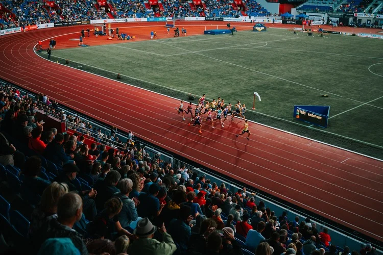 OSTRAVA, CZECHIA, MAY 28, 2024: 1500 meter professional Track and field Race. Elite Athletes in the pack, running on the track. Pre race before summer olympics Paris 2024 and European Championship