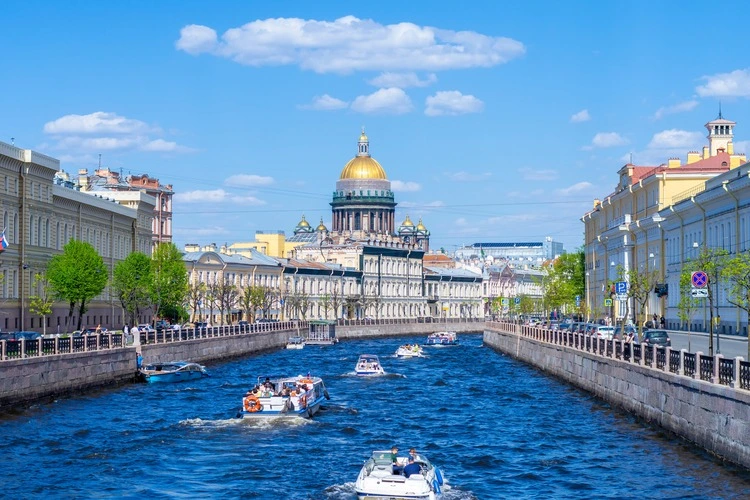 St. Petersburg, Russia, 17 May 2024: St. Isaac's Cathedral and Moyka river, Saint Petersburg, Russia