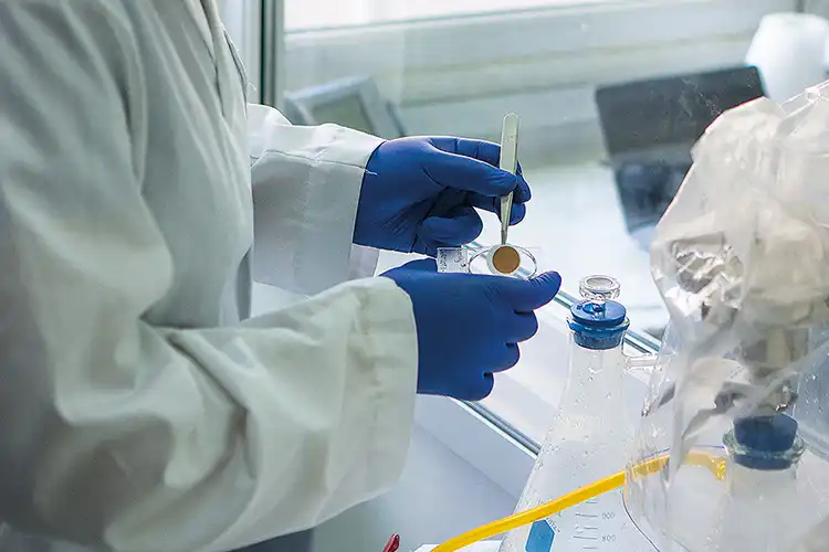 A scientist tests snow samples