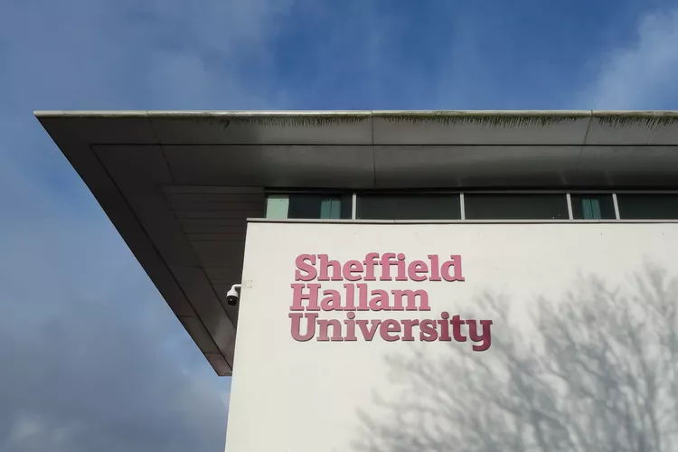 SHEFFIELD, ENGLAND - DECEMBER 7, 2019: Sheffield Hallam University sign on building in Sheffield, England