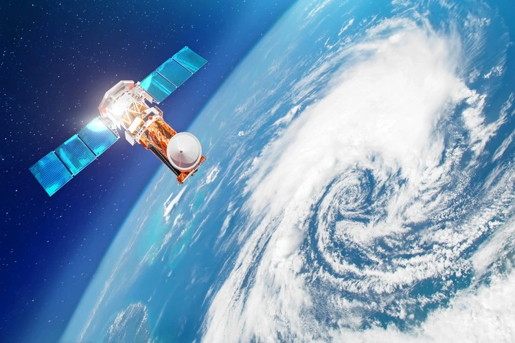 Satellite above the Earth makes measurements of the weather parameters.