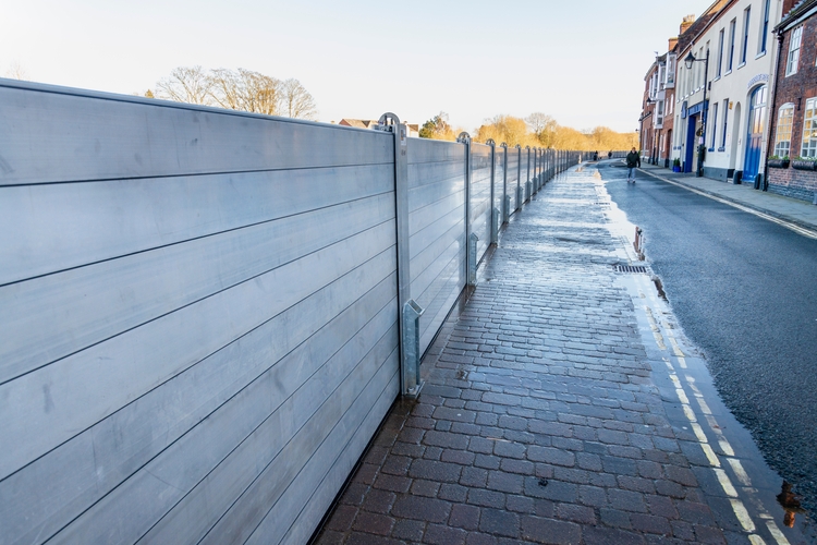 Bewdley,Worcestershire,England,UK- February 22 2022:Pre-prepared flood barriers erected to keep residents safe against dangerously high torrential waters of the River Severn.