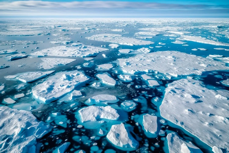 Fragmented ice floating in on the ocean surface in the Arctic Circle,