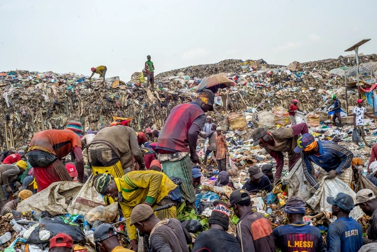 Lagos, Nigeria – Dec 24, 2020: Lagos Waste Management Authority (LAWMA) workers cleaning the city.