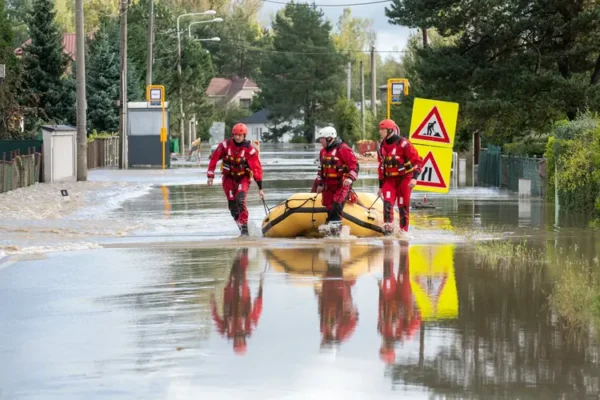 Ostrava, Czech republic - september 15 2024: Firefighters use a boat to rescue people from flooded areas during a major flood