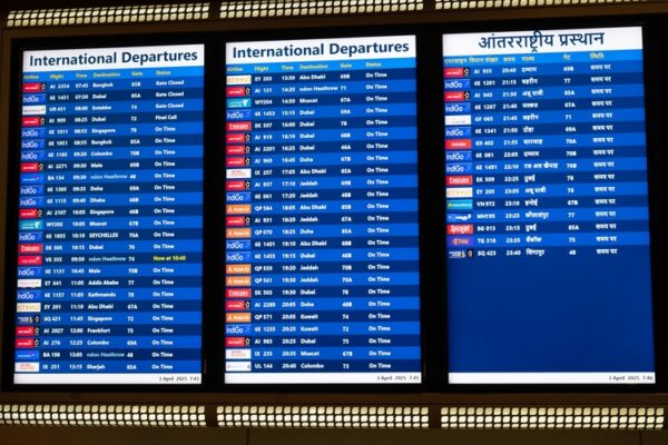 Airport scoreboard, timetable showing international departure times of flights, Mumbai, India, information display board, april 3rd 2025