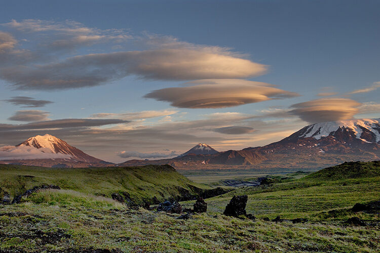 Lenticular clouds over the volcanoes Flat Tolbachik and Ostry