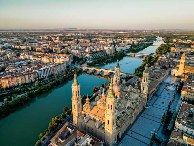 Spectacular Zaragoza city skyline at sunset.