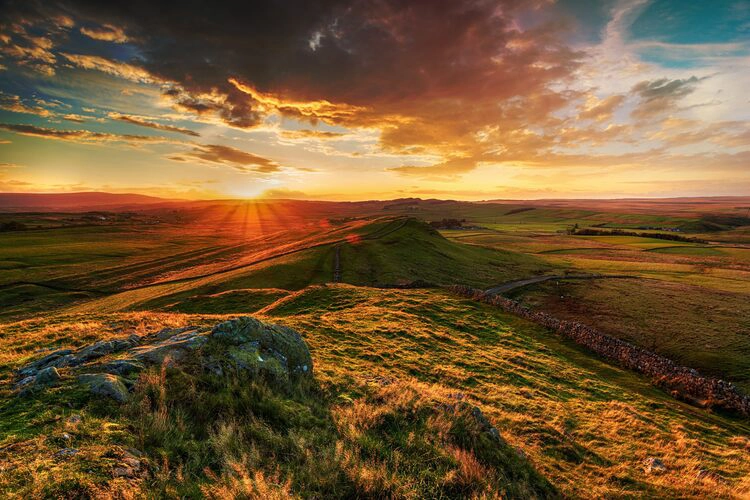 Sunset over Hadrians Wall from Caw Gap near Haltwhistle in Northumberland