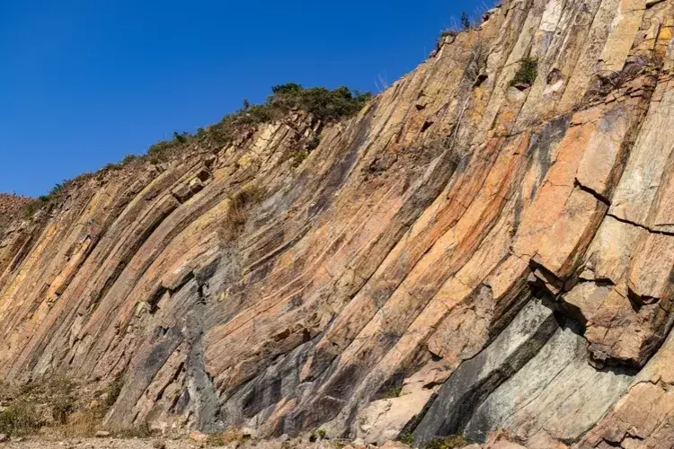Scenic view of slanted volcanic rock formation