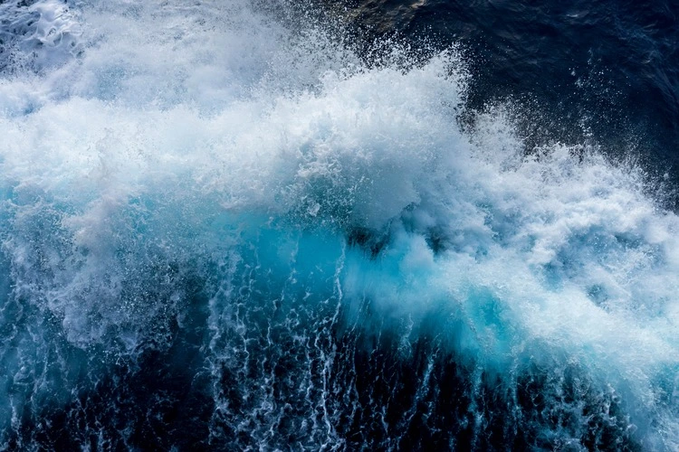 Wave splash created by an expedition cruise ship crossing the Drake passage en-route to Antarctica