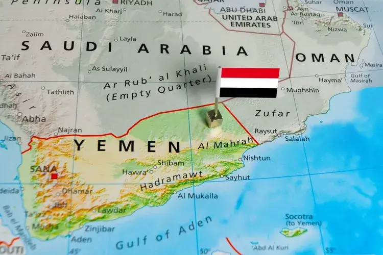 Map and national flag of Yemen (Republic of Yemen), a mixed-terrain country in Southern tip of the Arabian Peninsula in Middle East with Sana'a as its capital