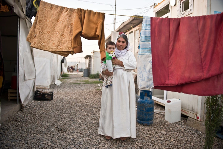 Yezidi woman and baby at Kanke refugee camp