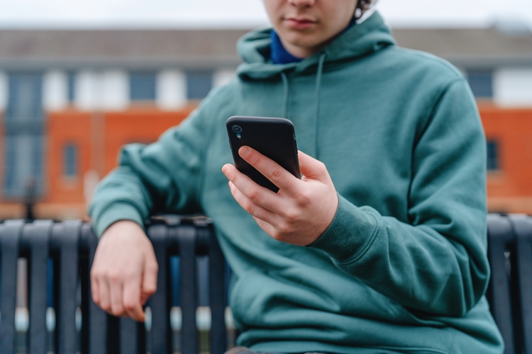 Young teenager on phone